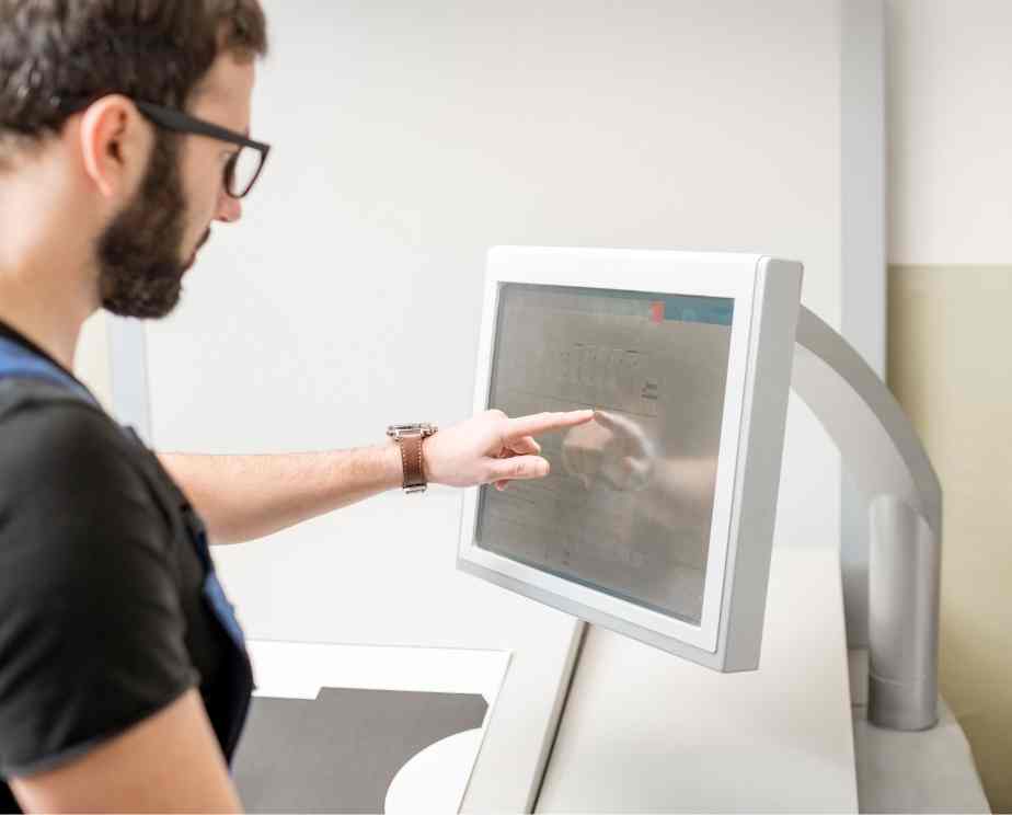 Radiographer working with a computer