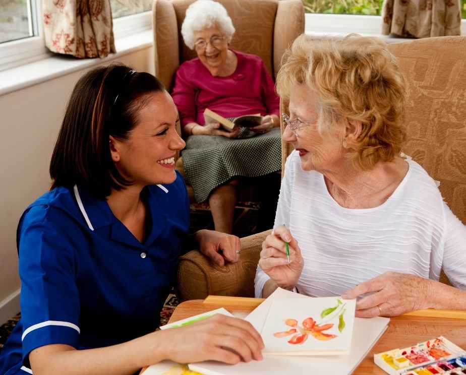 Care home staff with residents